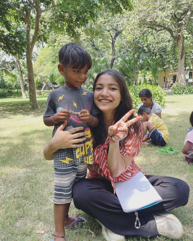 A volunteer with a child